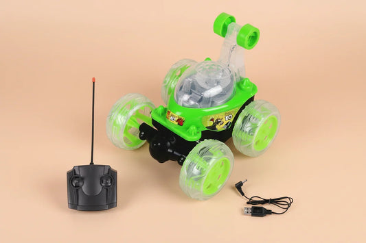 Green remote control toy stunt car with clear wheels, black controller, and charging cable.