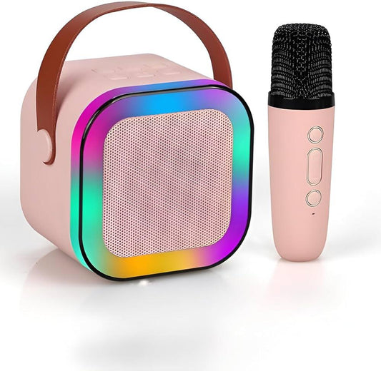 Pink portable Bluetooth speaker with colorful LED lights and matching wireless microphone