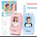 Two children's video walkie-talkie toys, one pink and one light blue, shown with their colorful retail box, charging cables, and a wrist strap on a white background.